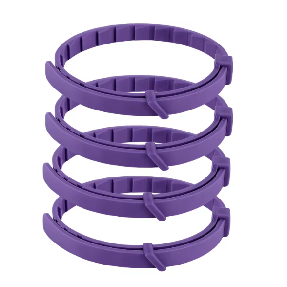 Purple plastic ring with a central cutout on a white background